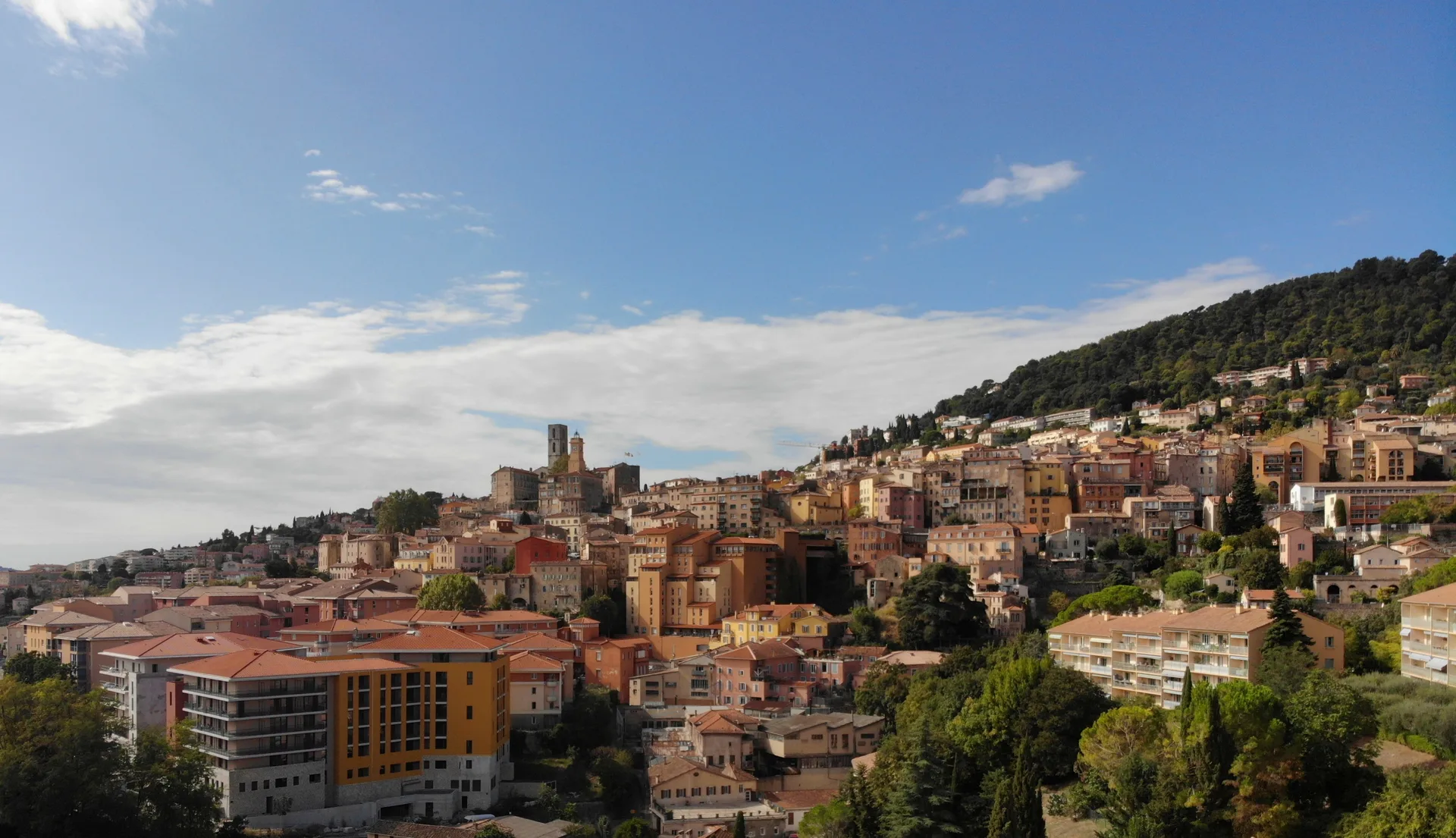 Panoramic overview of Grasse during spring with roses and flowers in bloom, UNESCO perfume heritage street