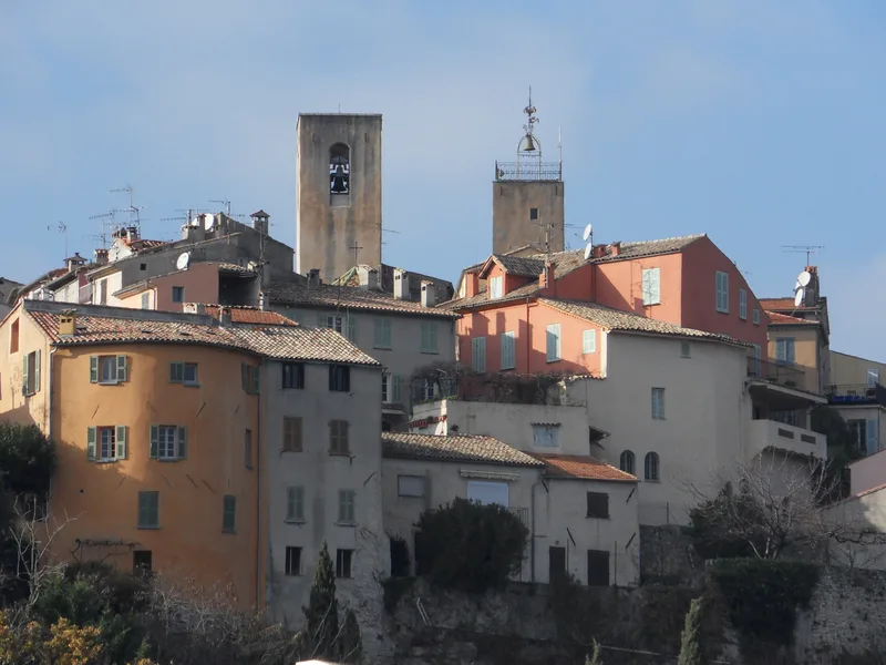 The medieval hilltop village of Biot, Alpes-Maritimes, with its twin bell towers and colourful Provençal facades — a village of artisan boutiques and galleries near Sophia Antipolis